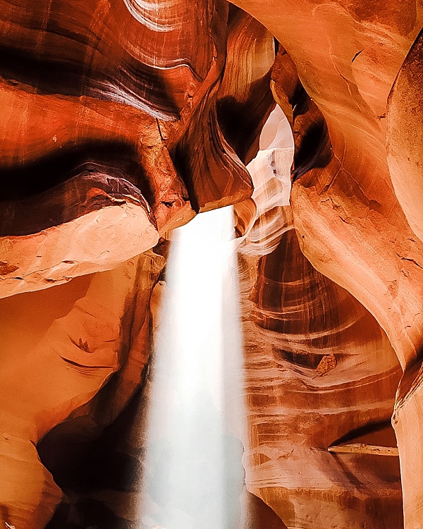 Sunlight pours through the top of Antelope Canyon