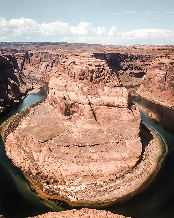 A view of the river bending around the canyons at Horseshoe Bend